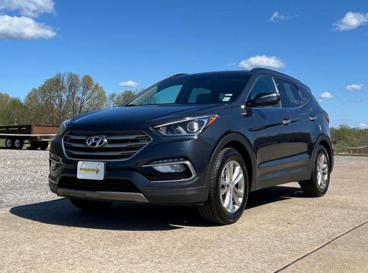 2018 BLUE /Tan HYUNDAI SANTA FE SPORT (5NMZU4LA0JH) with an 2.0L engine, Automatic transmission, located at 2990 Old Orchard Rd., Jackson, MO, 63755, 37.354214, -89.612106 - Photo#5