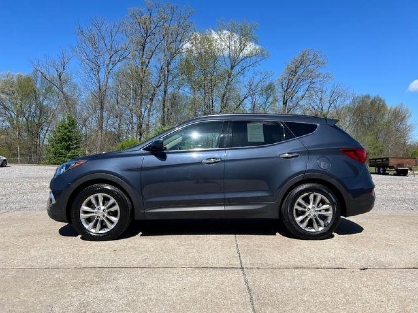 2018 BLUE /Tan HYUNDAI SANTA FE SPORT (5NMZU4LA0JH) with an 2.0L engine, Automatic transmission, located at 2990 Old Orchard Rd., Jackson, MO, 63755, 37.354214, -89.612106 - Photo#6