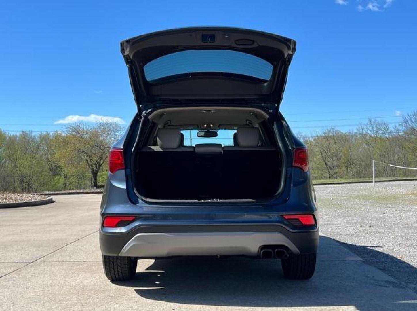 2018 BLUE /Tan HYUNDAI SANTA FE SPORT (5NMZU4LA0JH) with an 2.0L engine, Automatic transmission, located at 2990 Old Orchard Rd., Jackson, MO, 63755, 37.354214, -89.612106 - Photo#19