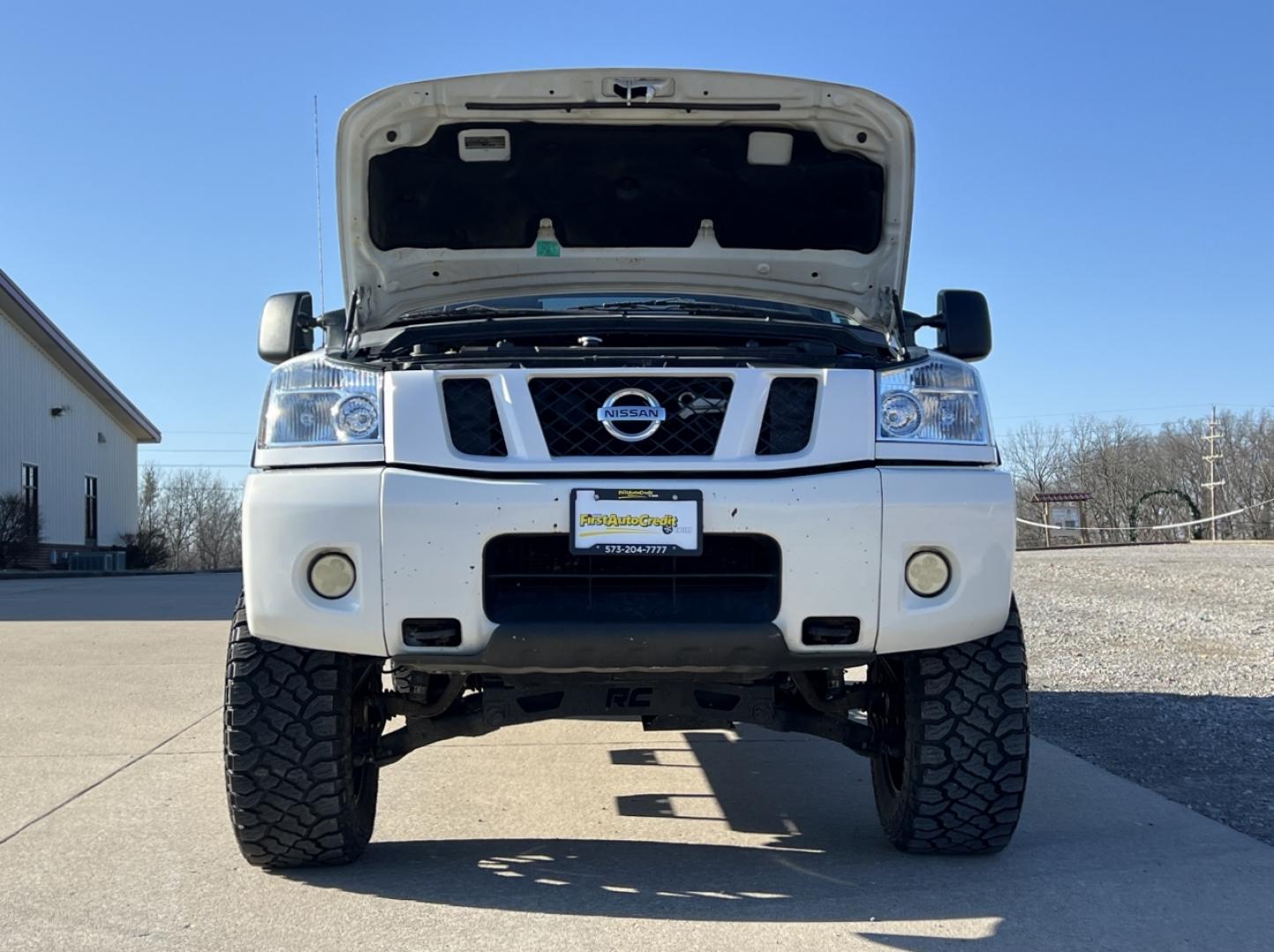 2012 WHITE /Black Leather Nissan Titan PRO-4X (1N6BA0EC6CN) with an 5.6L V8 engine, Automatic transmission, located at 2990 Old Orchard Rd., Jackson, MO, 63755, 37.354214, -89.612106 - 2012 Nissan Titan PRO-4X 165xxx miles 4x4 5.6L V8 Automatic Leather Navigation Rear Entertainment Power/Heated Seats Cruise Power Windows/Locks/Mirrors We have financing available and we accept trades! Fill out a credit application on our website or come by today! If you have any questio - Photo#35