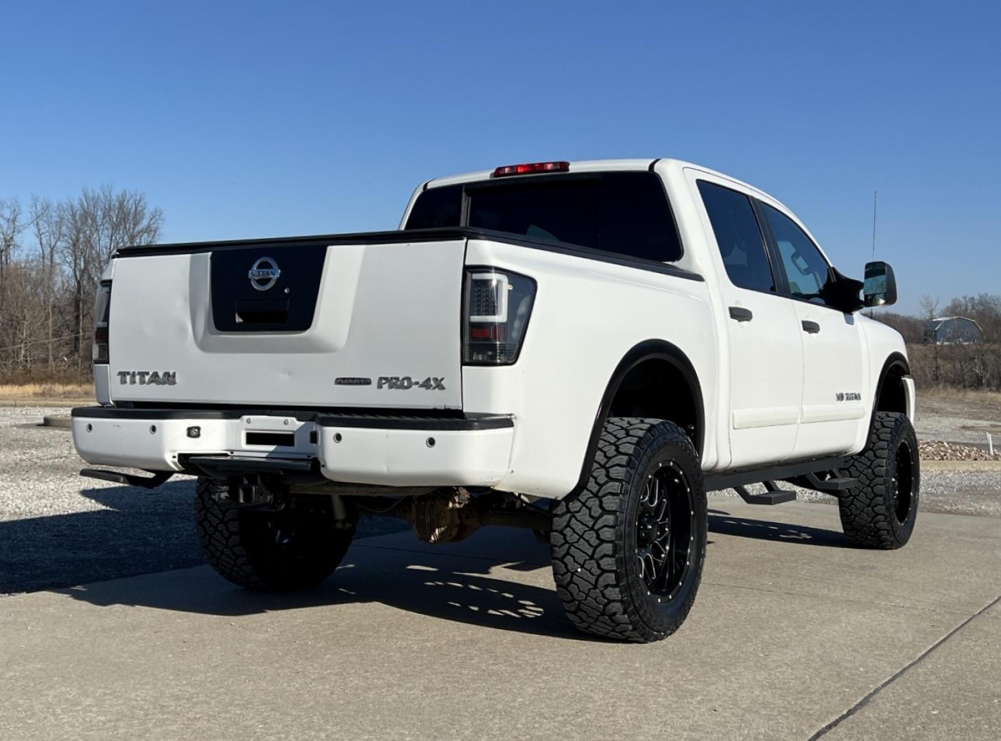 2012 WHITE /Black Leather Nissan Titan PRO-4X (1N6BA0EC6CN) with an 5.6L V8 engine, Automatic transmission, located at 2990 Old Orchard Rd., Jackson, MO, 63755, 37.354214, -89.612106 - 2012 Nissan Titan PRO-4X 165xxx miles 4x4 5.6L V8 Automatic Leather Navigation Rear Entertainment Power/Heated Seats Cruise Power Windows/Locks/Mirrors We have financing available and we accept trades! Fill out a credit application on our website or come by today! If you have any questio - Photo#11