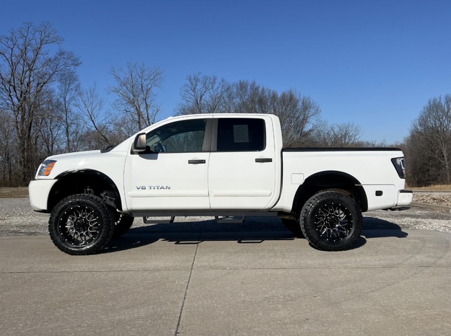 2012 WHITE /Black Leather Nissan Titan PRO-4X (1N6BA0EC6CN) with an 5.6L V8 engine, Automatic transmission, located at 2990 Old Orchard Rd., Jackson, MO, 63755, 37.354214, -89.612106 - 2012 Nissan Titan PRO-4X 165xxx miles 4x4 5.6L V8 Automatic Leather Navigation Rear Entertainment Power/Heated Seats Cruise Power Windows/Locks/Mirrors We have financing available and we accept trades! Fill out a credit application on our website or come by today! If you have any questio - Photo#9