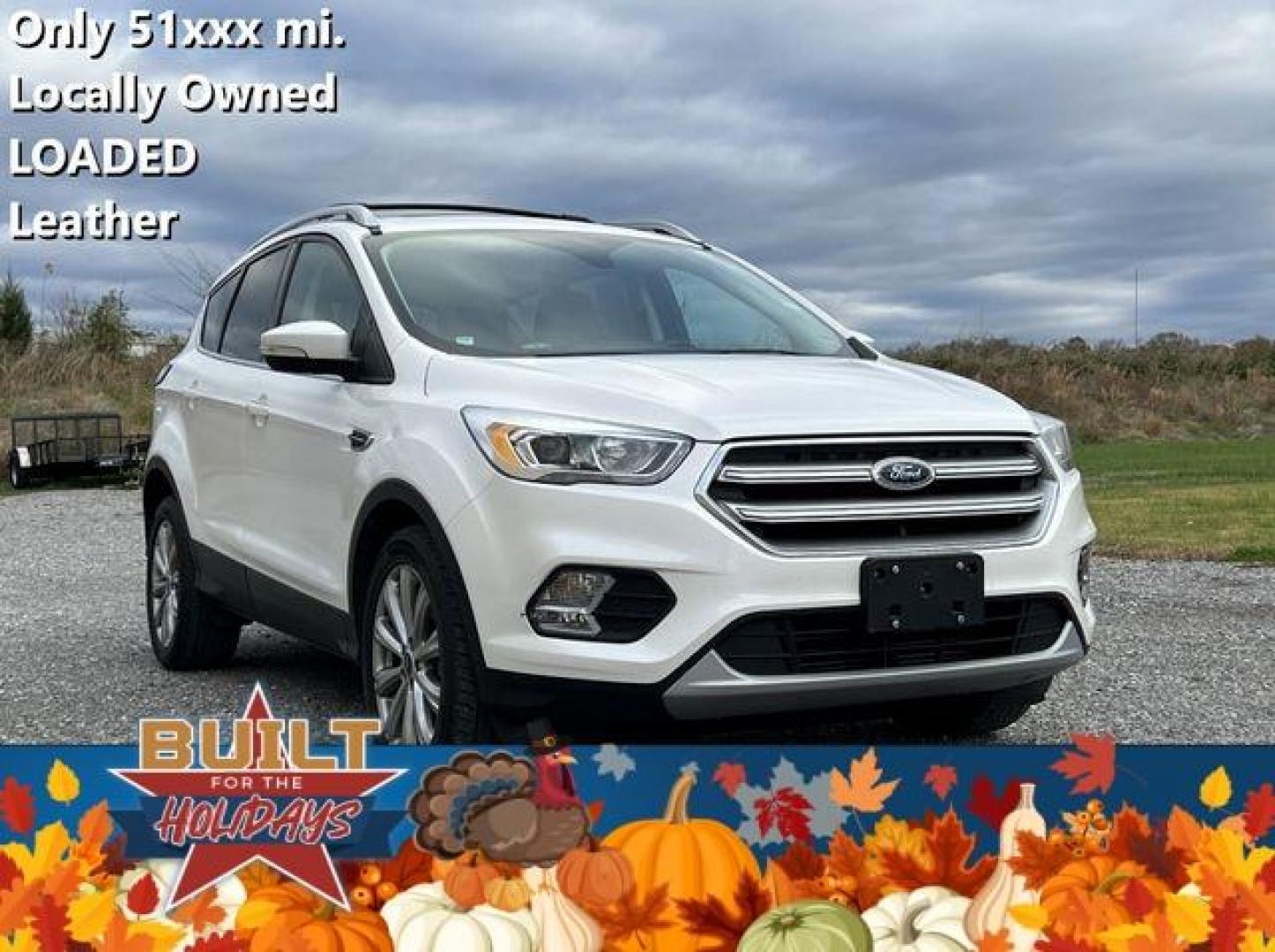 2017 WHITE /Tan FORD ESCAPE TITANIUM (1FMCU0J98HU) with an 2.0L engine, Automatic transmission, located at 2990 Old Orchard Rd., Jackson, MO, 63755, 37.354214, -89.612106 - Photo#0