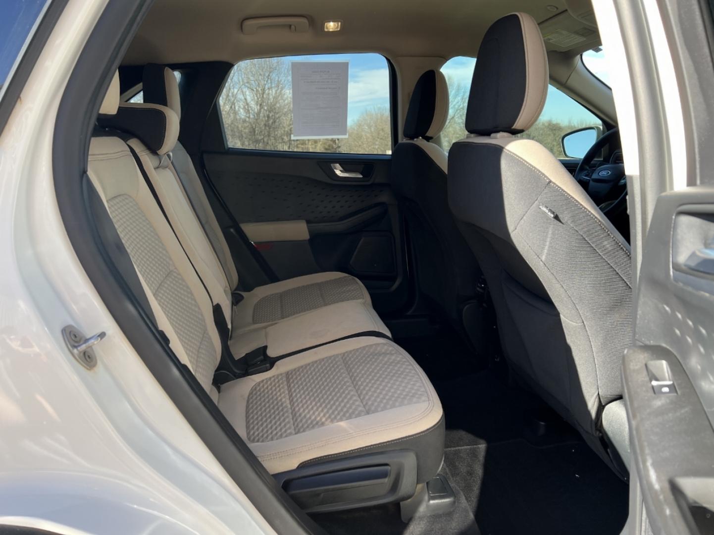 2020 WHITE /Tan Cloth FORD ESCAPE SE (1FMCU0G66LU) with an 1.5L 3 Cyl. engine, Automatic transmission, located at 2990 Old Orchard Rd., Jackson, MO, 63755, 37.354214, -89.612106 - 2020 Ford Escape SE Local 1-Owner 75xxx miles Front Wheel Drive 1.5L 3 Cyl. Automatic Navigation Backup Camera Heated Seats Power Driver Seat Bluetooth Cruise Power Windows/Locks/Mirrors We have financing available and we accept trades! Fill out a credit application on our website or co - Photo#18