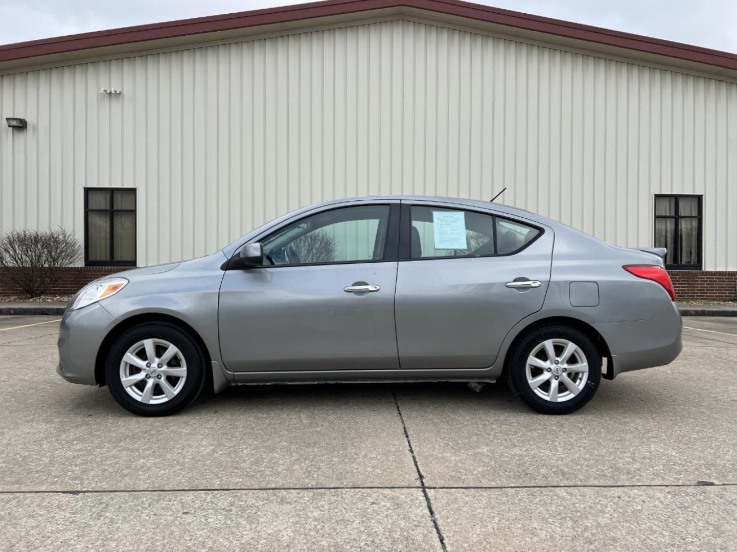 2014 GREY /Black Cloth NISSAN VERSA SV (3N1CN7AP5EL) with an 1.6L 4 Cyl. engine, Continuously Variable transmission, located at 2990 Old Orchard Rd., Jackson, MO, 63755, 37.354214, -89.612106 - 2014 Nissan Versa SV 143xxx miles Front Wheel Drive 1.6L 4 Cyl. Automatic Cruise Power Windows/Locks/Mirrors We have financing available and we accept trades! Fill out a credit application on our website or come by today! If you have any questions, give us a call at (573) 204-7777 or visit o - Photo#3