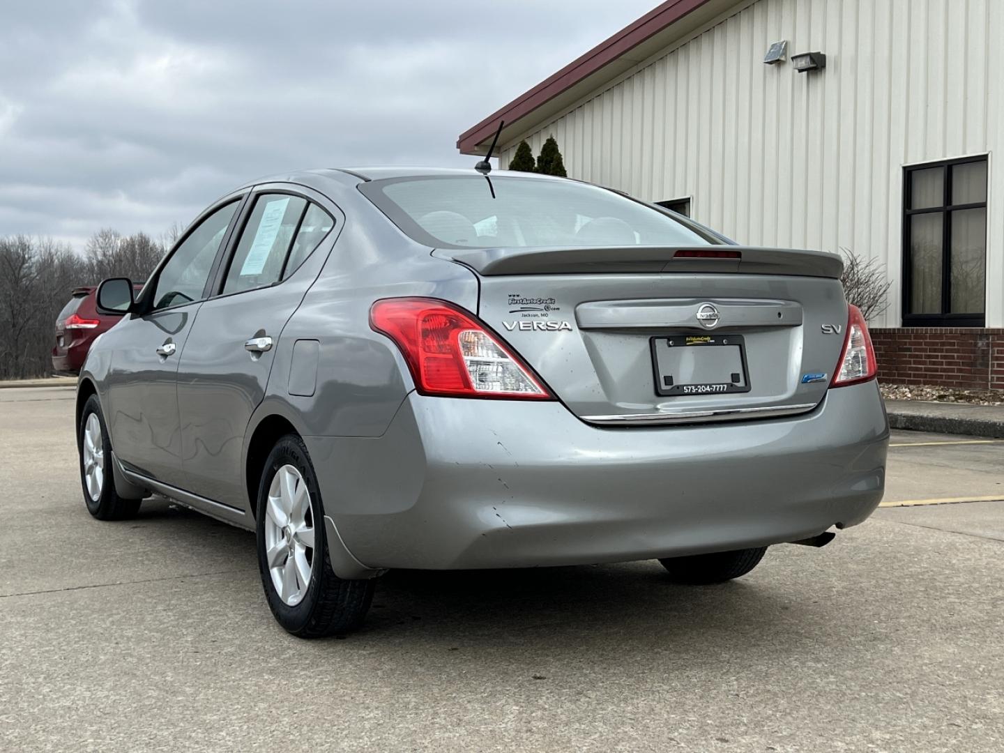 2014 GREY /Black Cloth NISSAN VERSA SV (3N1CN7AP5EL) with an 1.6L 4 Cyl. engine, Continuously Variable transmission, located at 2990 Old Orchard Rd., Jackson, MO, 63755, 37.354214, -89.612106 - 2014 Nissan Versa SV 143xxx miles Front Wheel Drive 1.6L 4 Cyl. Automatic Cruise Power Windows/Locks/Mirrors We have financing available and we accept trades! Fill out a credit application on our website or come by today! If you have any questions, give us a call at (573) 204-7777 or visit o - Photo#6