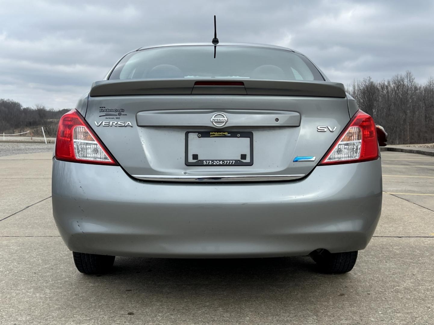 2014 GREY /Black Cloth NISSAN VERSA SV (3N1CN7AP5EL) with an 1.6L 4 Cyl. engine, Continuously Variable transmission, located at 2990 Old Orchard Rd., Jackson, MO, 63755, 37.354214, -89.612106 - 2014 Nissan Versa SV 143xxx miles Front Wheel Drive 1.6L 4 Cyl. Automatic Cruise Power Windows/Locks/Mirrors We have financing available and we accept trades! Fill out a credit application on our website or come by today! If you have any questions, give us a call at (573) 204-7777 or visit o - Photo#7