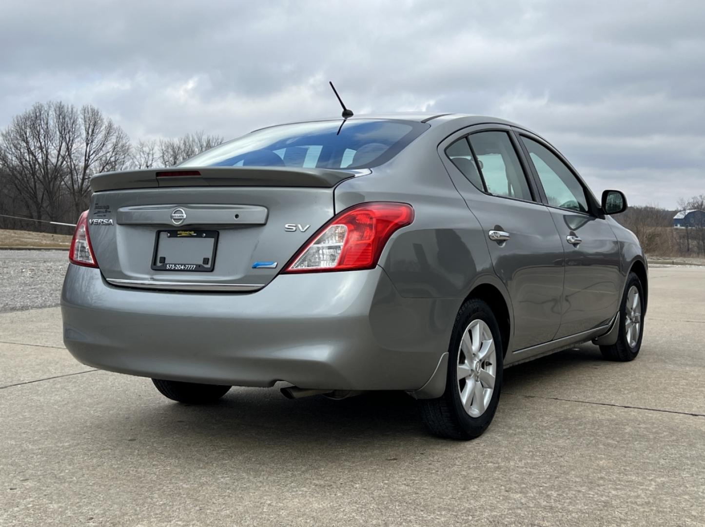 2014 GREY /Black Cloth NISSAN VERSA SV (3N1CN7AP5EL) with an 1.6L 4 Cyl. engine, Continuously Variable transmission, located at 2990 Old Orchard Rd., Jackson, MO, 63755, 37.354214, -89.612106 - 2014 Nissan Versa SV 143xxx miles Front Wheel Drive 1.6L 4 Cyl. Automatic Cruise Power Windows/Locks/Mirrors We have financing available and we accept trades! Fill out a credit application on our website or come by today! If you have any questions, give us a call at (573) 204-7777 or visit o - Photo#5