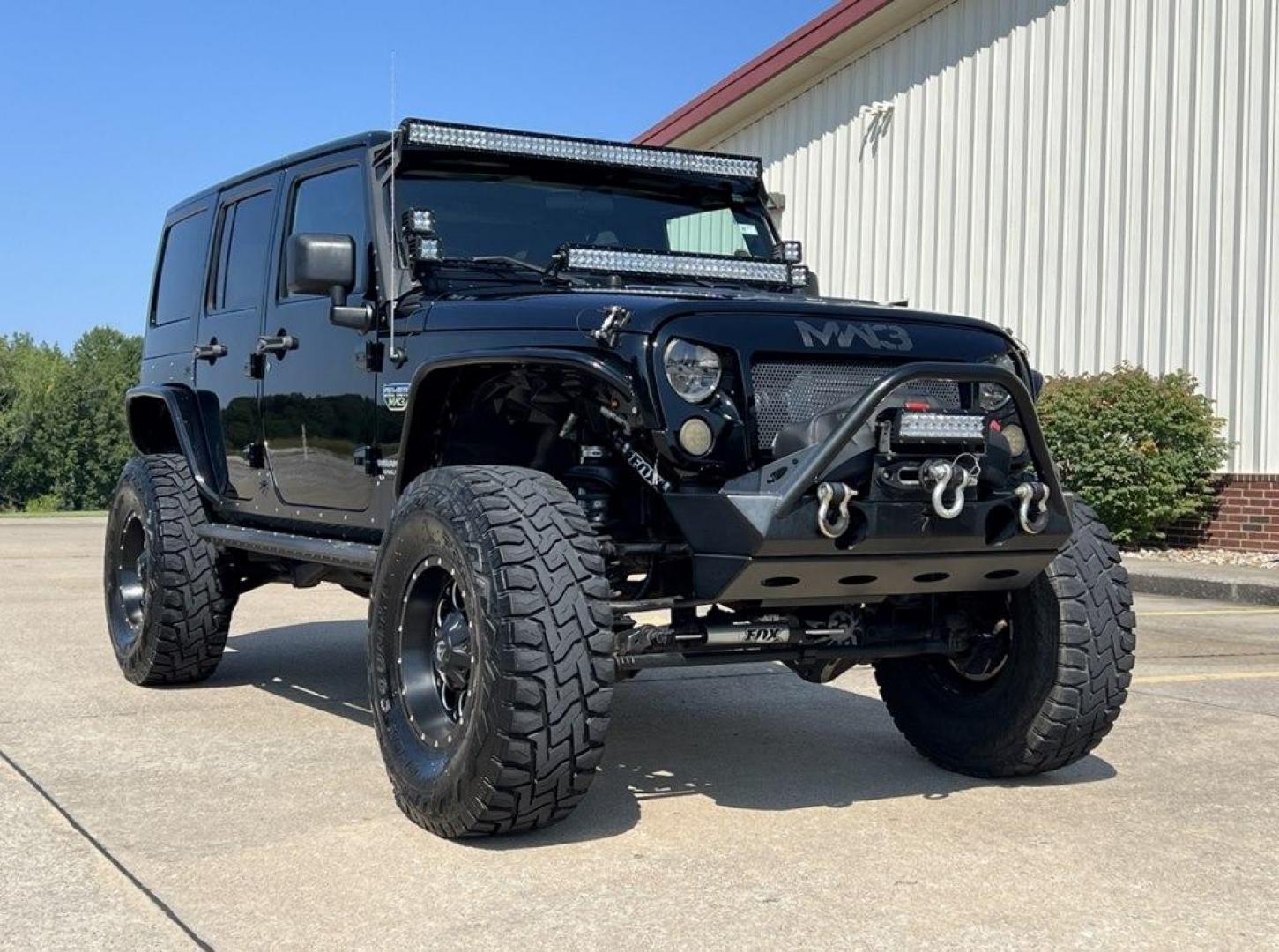 2012 BLACK /Black JEEP WRANGLER UNLIMI MW3 SPECIAL EDITION (1C4HJWFG6CL) with an 3.6L engine, Automatic transmission, located at 2990 Old Orchard Rd., Jackson, MO, 63755, 37.354214, -89.612106 - Photo#0