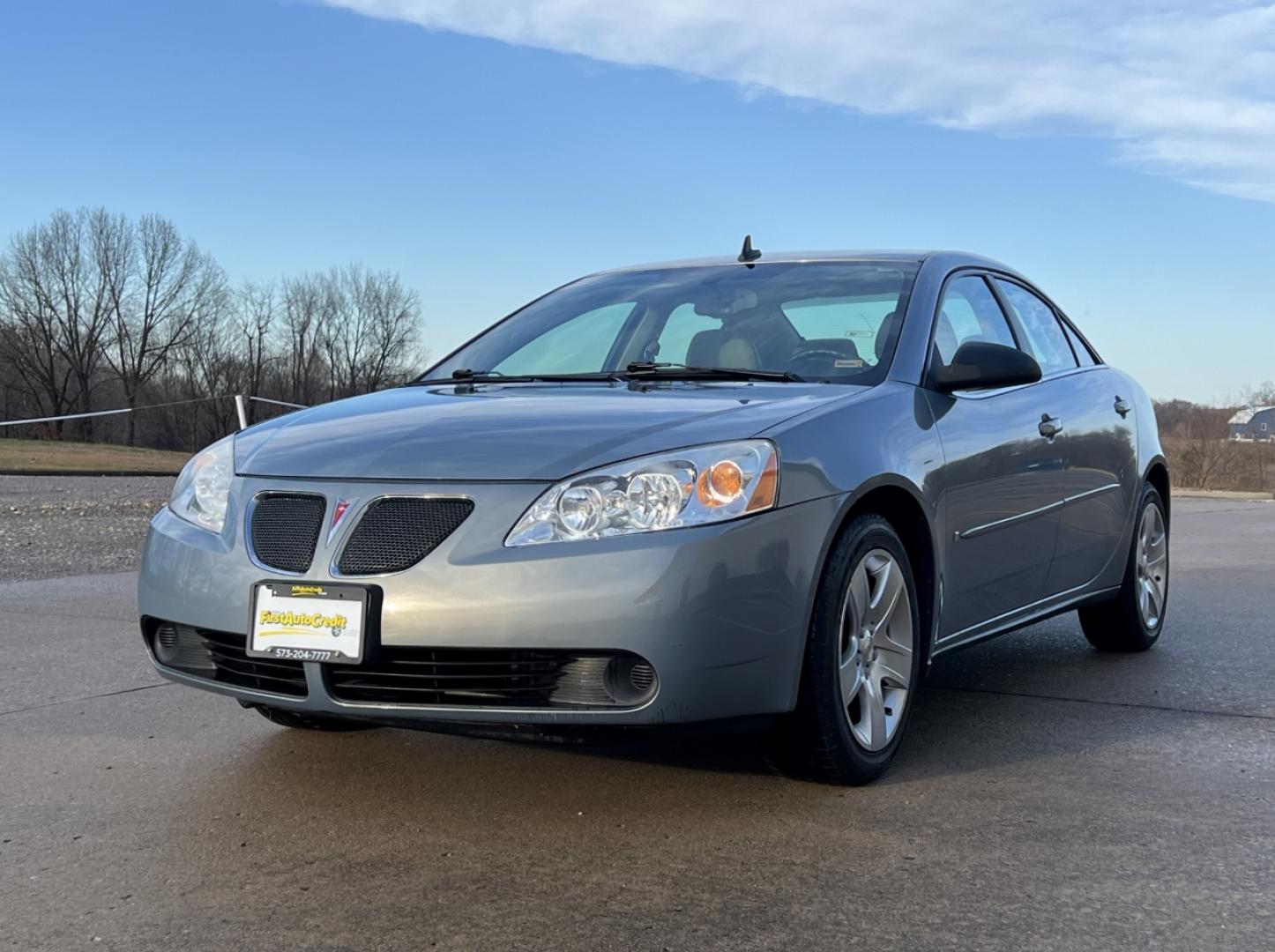 2009 GREY /Tan Cloth Pontiac G6 Sedan (1G2ZG57B694) with an 2.4L 4 Cyl. engine, 4-Speed Automatic Overdrive transmission, located at 2990 Old Orchard Rd., Jackson, MO, 63755, 37.354214, -89.612106 - 2009 Pontiac G6 Only 48xxx miles Front Wheel Drive 2.4L 4 Cyl. Automatic Cruise Power Windows/Locks/Mirrors We have financing available and we accept trades! Fill out a credit application on our website or come by today! If you have any questions, give us a call at (573) 204-7777 or vi - Photo#2