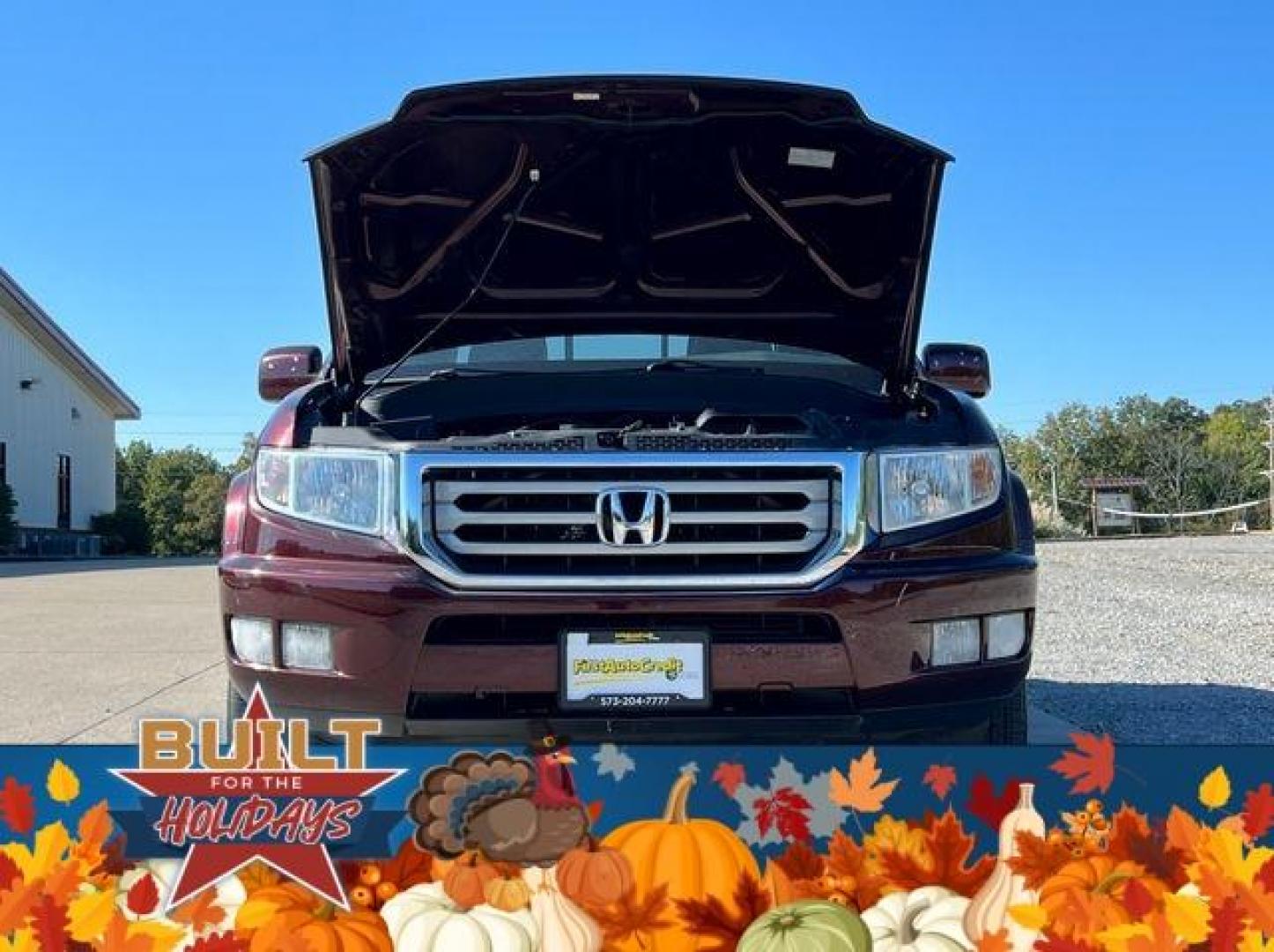 2013 MAROON /Black HONDA RIDGELINE RTL (5FPYK1F59DB) with an 3.5L engine, Automatic transmission, located at 2990 Old Orchard Rd., Jackson, MO, 63755, 37.354214, -89.612106 - Photo#32